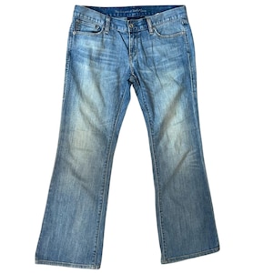 Jeans Levi's Eco Ultra Low Boot Light Wash 522 de mezclilla vintage para mujer, talla 8S