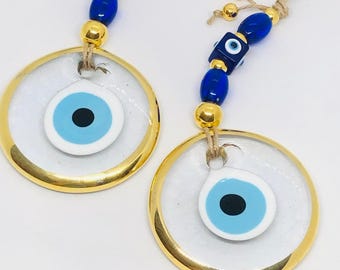 Handgemaakte glazen wanddecoratie met het boze oog, decoratie voor huisbescherming.