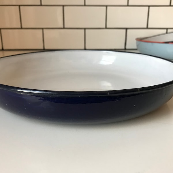 Nice navy enamelware tray with white interior, no contrasting trim