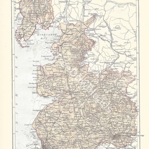 May include: A vintage map of Lancashire, England, with detailed lines showing roads, rivers, and towns. The map is printed in black and white with brown and red accents. The map is titled "Lancashire" and includes the text "ENCYCLOPEDIA BRITANNICA NINTH EDITION".