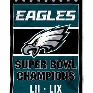 May include: A vertical flag featuring the Philadelphia Eagles logo and text. The flag has a black border with a teal background. The text reads "EAGLES" and "SUPER BOWL CHAMPIONS LII - LIX". The Eagles logo is a white and gray eagle head.