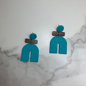 Turquoise and Dark Wood Thick Arches