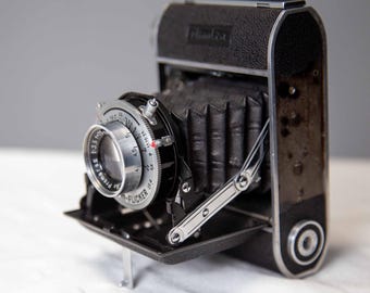 Vintage Minolta Konan Flicker Faltkamera mit Ledertasche - 1950er Jahre Sammlerstück