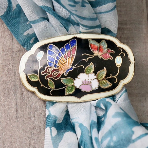 Vintage cloisonne scarf clip with butterflies and flower designs. black, white and multicolored enamel on brass clip