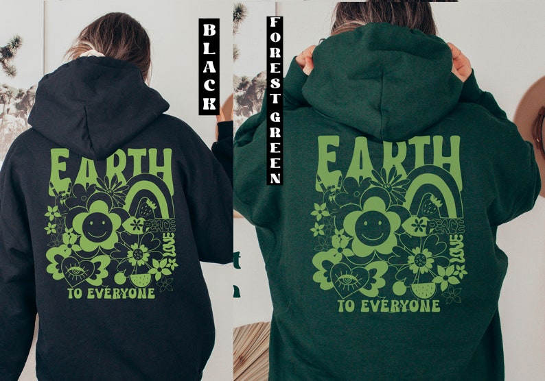 May include: A black and forest green hoodie with a green graphic print on the back. The graphic features the word "EARTH" in large letters, a smiley face flower, and the words "PEACE LOVE TO EVERYONE".