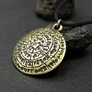 Phaistos disc curved necklace, Ancient greek jewelry, Greek mythology Greek jewellery disc necklace,Greek necklace Phaistos disk,Minoan disc