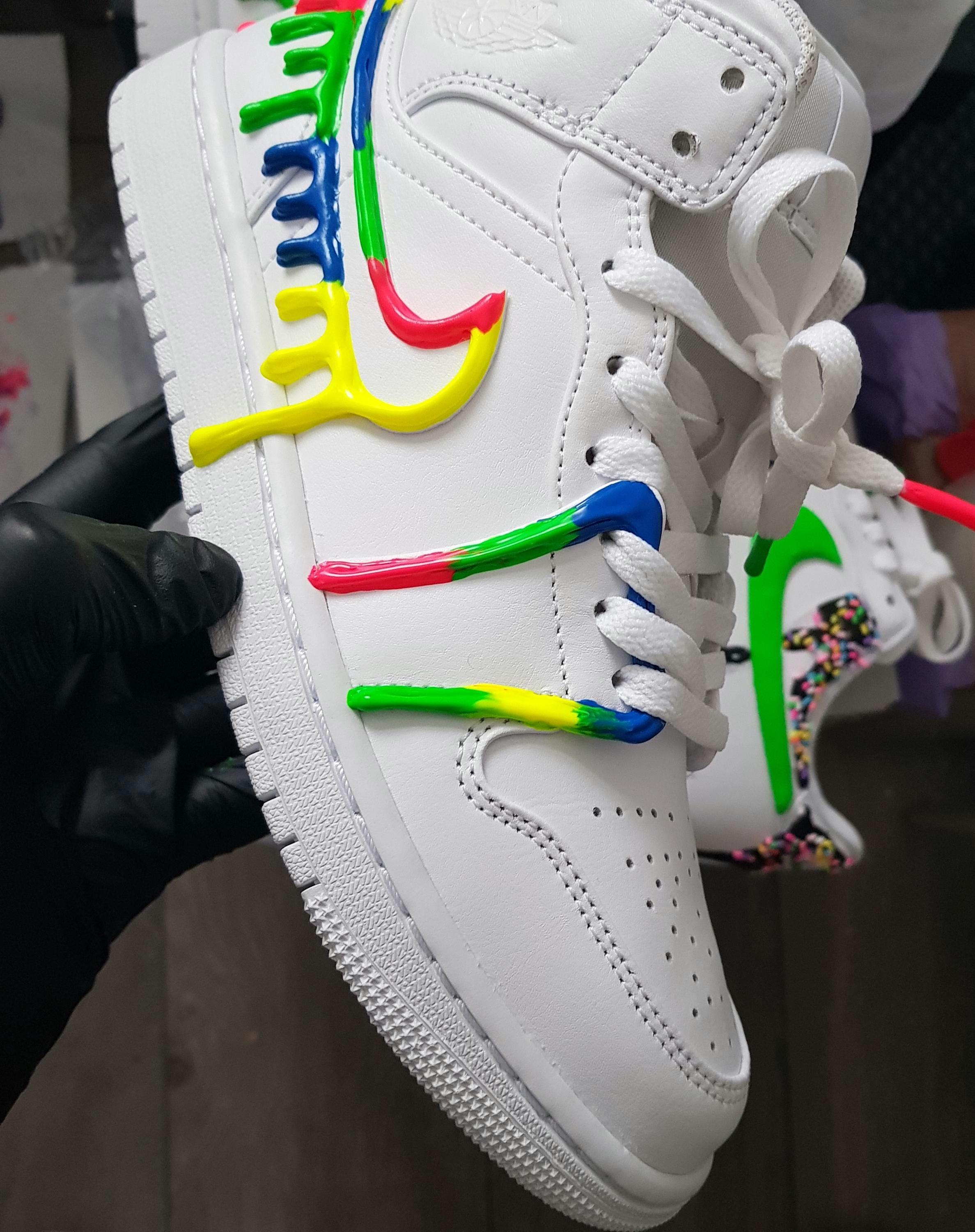 white jordans with neon colors