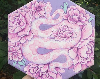 May include: A purple canvas painting featuring a pink snake entwined around pink peonies. The snake has a white and pink pattern.