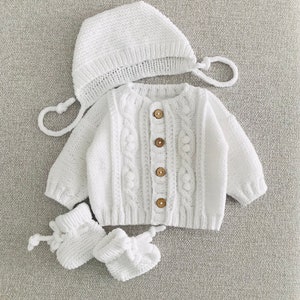 Adorable Knitted Baby Cardigan Set: White and Cozy with Hat and Booties Baby coming home outfit image 5
