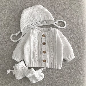 Adorable Knitted Baby Cardigan Set: White and Cozy with Hat and Booties Baby coming home outfit image 6