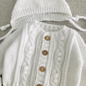 Adorable Knitted Baby Cardigan Set: White and Cozy with Hat and Booties Baby coming home outfit image 10