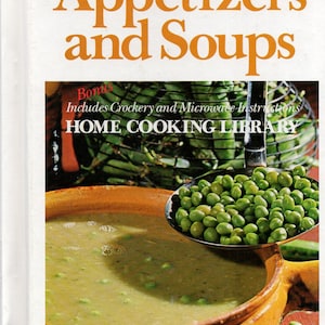 May include: A cookbook cover titled "Appetizers and Soups" with the text "Home Cooking Library." The image features a bowl of green soup with peas, a ladle of peas, and a background of green vegetables.