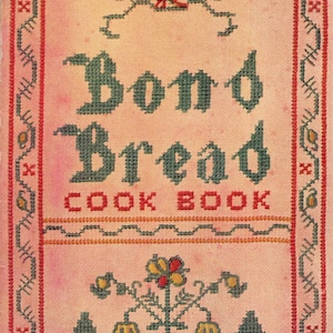 May include: A vintage cookbook cover with cross-stitch embroidery. The title "Bond Bread COOK BOOK" is in green letters. The cover features floral and bird motifs in red, yellow, and green, framed by a decorative border. The background is a light pink.
