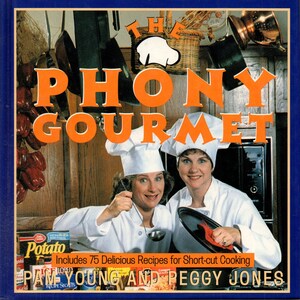 May include: The cover of a cookbook titled "The Phony Gourmet" with two women in chef hats and coats. The title is in orange letters. The cover also includes the text "Includes 75 Delicious Recipes for Short-cut Cooking" and the names "Pam Young and Peggy Jones".