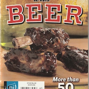 May include: A cookbook cover with the title "COOKING with BEER" in red and white lettering. The image features cooked ribs with a glossy, dark brown glaze. The cover also states "More than 50 simple recipes".
