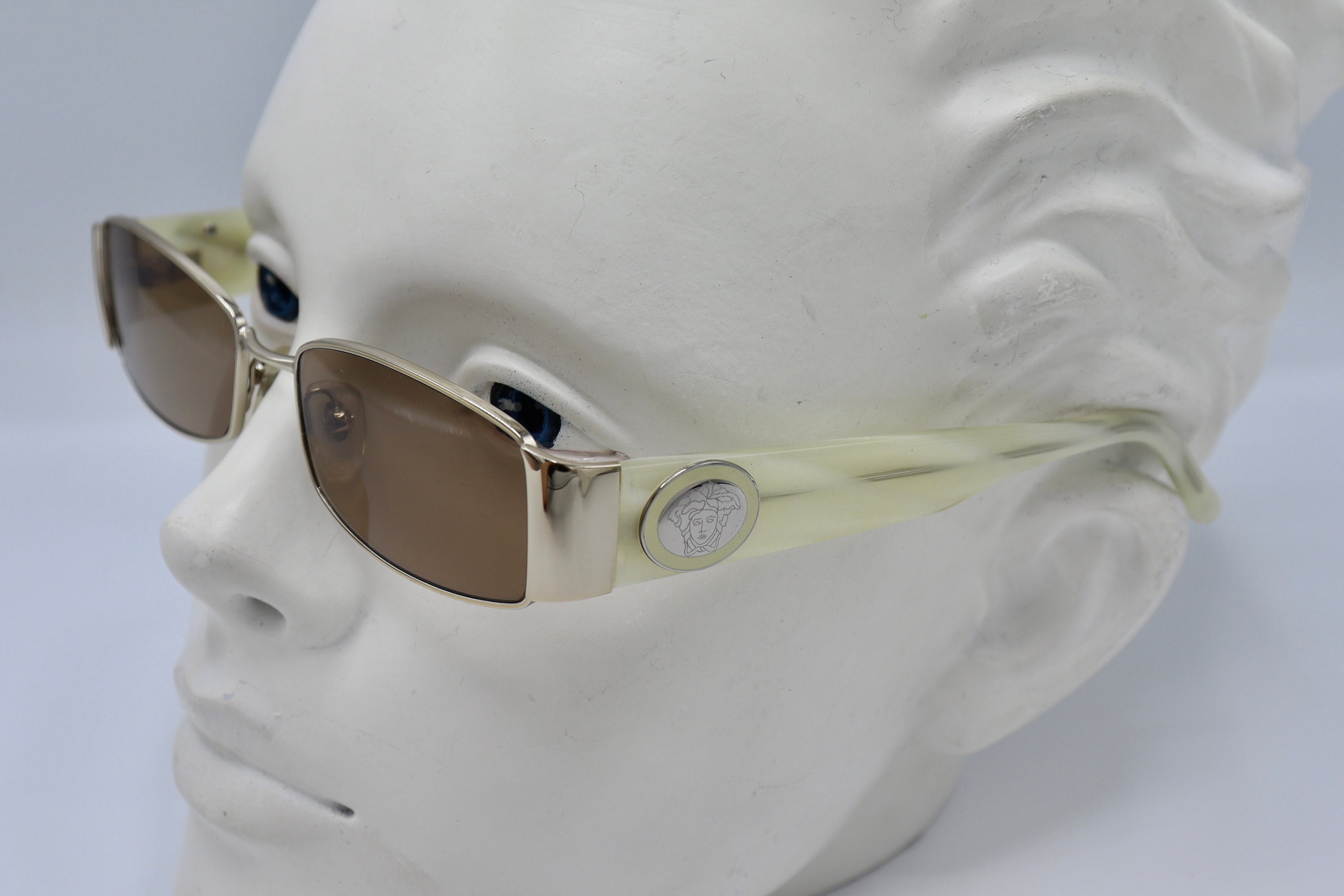 White and gold versace glasses sales
