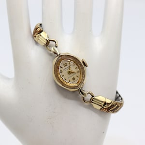 Speidel Reloj de bolsillo dorado con esfera blanca y cadena de 14 pulgadas