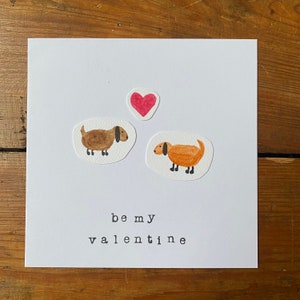 Carte aquarelle faite main de chien de saucisse de Saint-Valentin