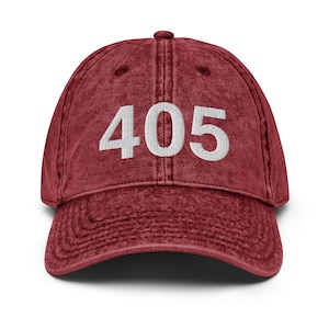 May include: A red vintage-style baseball cap with white embroidered text that reads "405".
