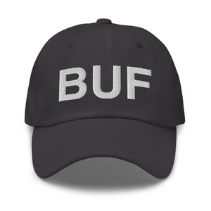 May include: A black baseball cap with white embroidered text that reads "BUF".