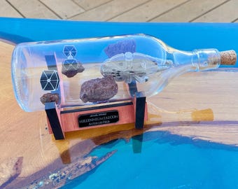 Millennium Falcon Asteroid Chase in a Bottle