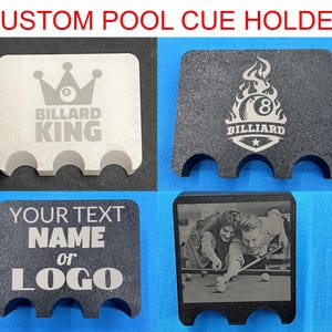 May include: Custom pool cue holders in a variety of designs. One holder is white with a crown and the words "BILLIARD KING". Another is black with a flame design and the number 8. A third has the words "YOUR TEXT NAME or LOGO". The last has a photo of people playing pool.