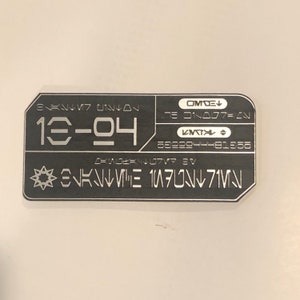 Placa/cartão de dados gravado a laser Blaster IB-94 em Aurebesh