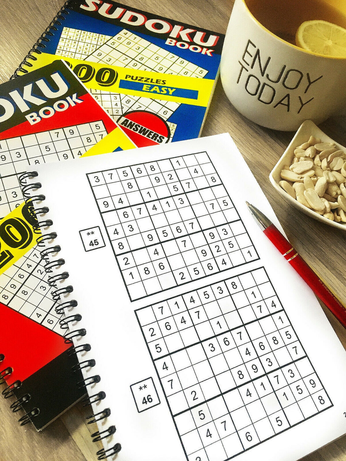 sudoku book 200 puzzles easy 2 levels answers spiral binding etsy