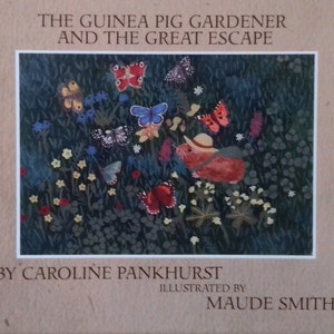 May include: A children's book cover illustration featuring a guinea pig wearing a hat and backpack, surrounded by flowers and butterflies. The title of the book is "The Guinea Pig Gardener and the Great Escape" by Caroline Pankhurst, illustrated by Maude Smith.