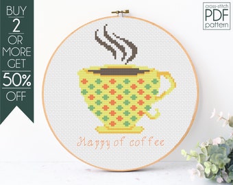 May include: Cross-stitch pattern for a yellow coffee cup with a brown handle and steam coming out of the top. The cup has a green and orange polka dot pattern. The text "Happy of coffee" is written below the cup.