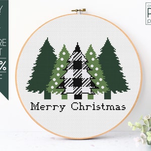 Può includere: Schema di ricamo a punto croce con tre alberi di Natale, uno con un design a quadri bianco e nero, e il testo "Buon Natale".