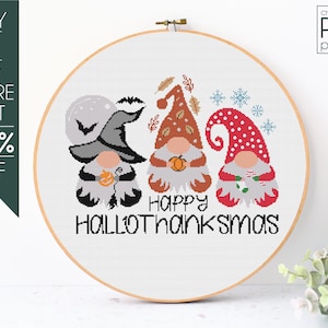 May include: Cross-stitch pattern featuring three gnomes dressed for Halloween, Thanksgiving, and Christmas. The gnomes are holding pumpkins, fall leaves, and candy canes. The text "HAPPY HALLOThanksmas" is below the gnomes.