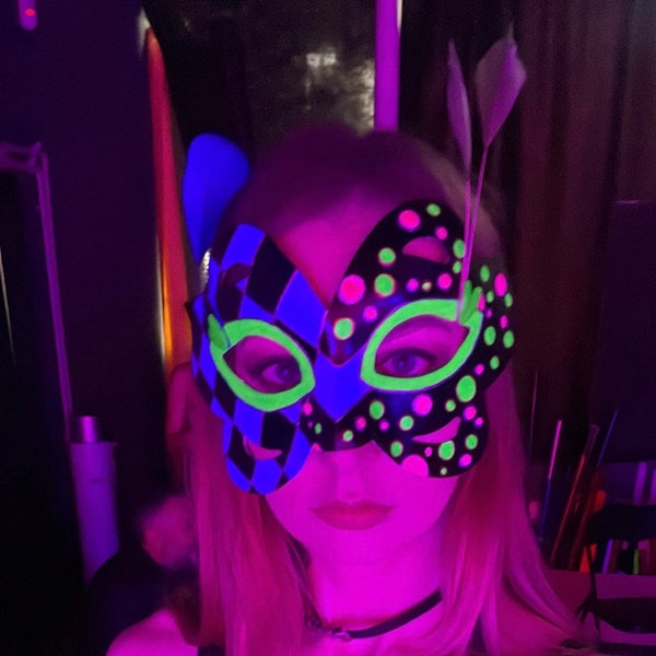 Neon mask with feathers