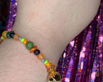 Pulsera con cuentas inspirada en los guantes de Coraline
