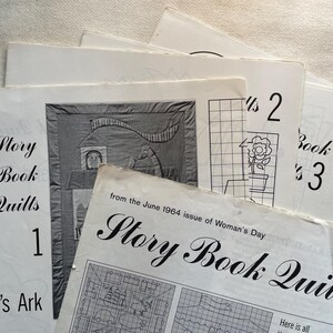 May include: A collection of vintage quilt pattern booklets. The booklets are white with black text and illustrations. The titles include "Story Book Quilts" and "Noah's Ark." One booklet is from the June 1964 issue of Woman's Day.