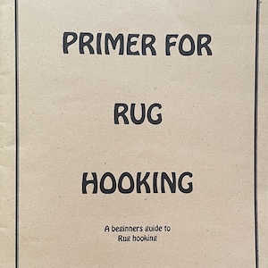 May include: A book cover with the title "THE PRIMER FOR RUG HOOKING" in bold black letters. Below the title is the text "A beginners guide to Rug hooking". The author is Tara Lynn Darr, and the publisher is Sew Unique Creations. The background is a light brown color.