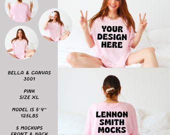 May include: Pink Bella + Canvas 3001 unisex t-shirt mockup with the text "YOUR DESIGN HERE" on the front and "LENNON SMITH MOCKS" on the back. The model is wearing a size XL.