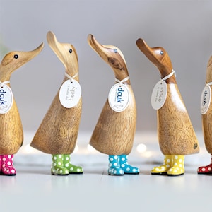 Natural Wood Ducklings wearing Spotty Welly Boots