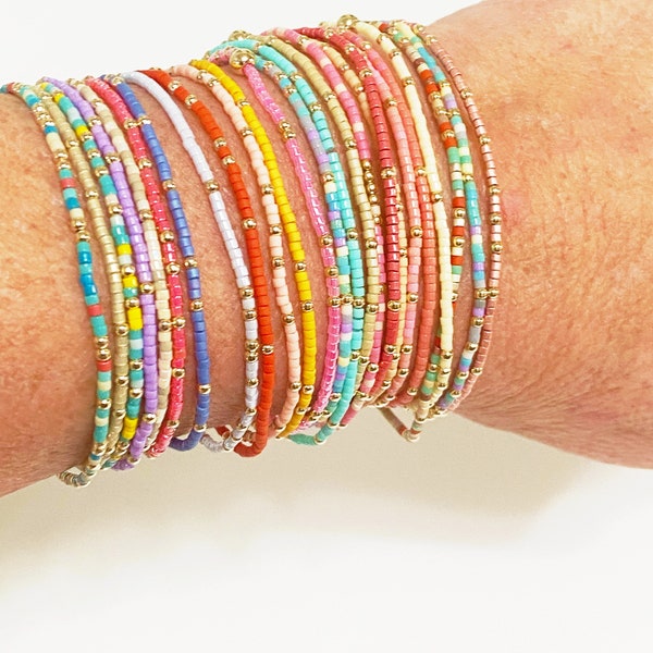 Summer mix of 14kt Gold filled color beaded bangle stack bracelets in fun summer colors.