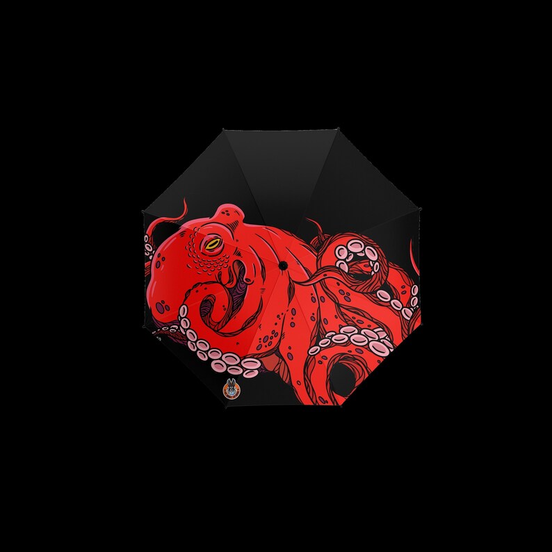 A Red Octopus in the dark depths of the ocean umbrella, designed to inspire diver and other lovers of the sea | Fat Rabbit Network