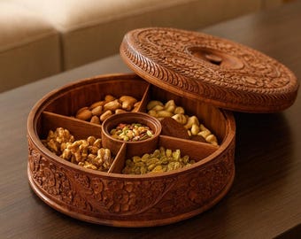 May include: A circular wooden serving platter with a carved floral pattern. It's divided into six sections, each holding different nuts and dried fruits. The lid, also carved, is partially open, displaying the contents. The tray is approximately 30 cm in diameter.