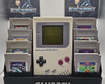 Suporte para Game Boy DMG, ideal para jogos e consoles.