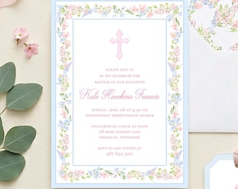 Puede incluir: Una tarjeta de invitación de bautizo rectangular con un borde azul claro y un marco floral de acuarela en rosa, azul y verde. El centro muestra una cruz rosa y el texto: Please join us as we celebrate the baptism of our daughter Kate Hawkins Francis.