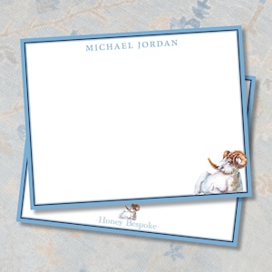 May include: Two personalized stationery sheets with a light blue border and the name "MICHAEL JORDAN" at the top. A watercolor illustration of a ram is in the corner. The text "Honey Bespoke" is at the bottom.