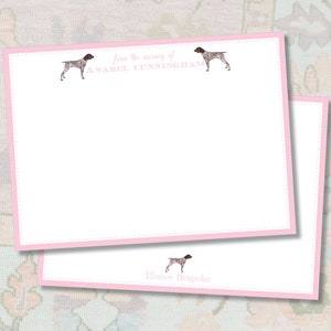 May include: Two pink stationery note cards with a pink border. The top card has a black and white illustration of a dog and the text "from the writing of ANABEL CUNNINGHAM". The bottom card has a black and white illustration of a dog and the text "Honey Bespoke".