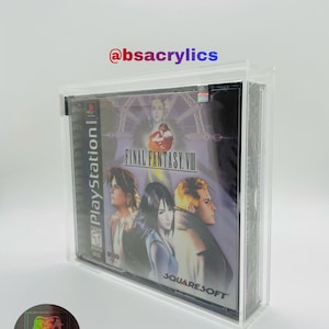 May include: A clear acrylic display case for a PlayStation game. The game case features the Final Fantasy VIII cover art with characters and the Squaresoft logo. The case has the text "@bsacrylics" and a sticker with the same logo.