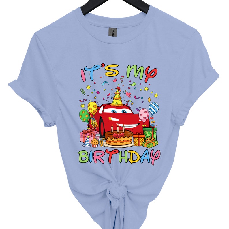 a blue shirt with a cartoon character on it