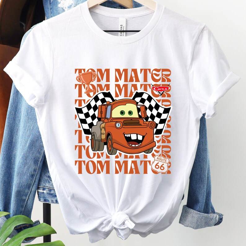 a white t - shirt with a cartoon character on it