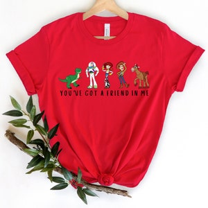 a red t - shirt with the words you've got a friend in me