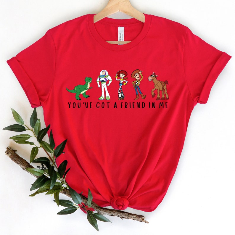 a red t - shirt with the words you've got a friend in me